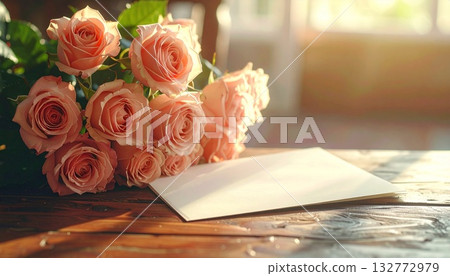 High resolution composition of a bouquet of roses and a card placed on a wooden table High resolution composition of a bouquet of roses and a card placed on a wooden table 132772979