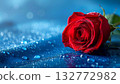 High-resolution close-up of a single red rose floating against a blue background 132772982
