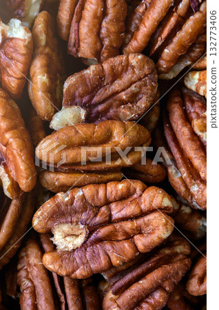 Pecan nuts. Close up of pecan nuts background. Top view 132773406