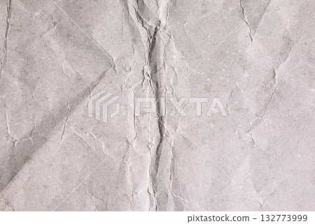 Crumpled distress old paper texture with crease folded in the middle Crumpled distress old paper texture with crease folded in the middle 132773999