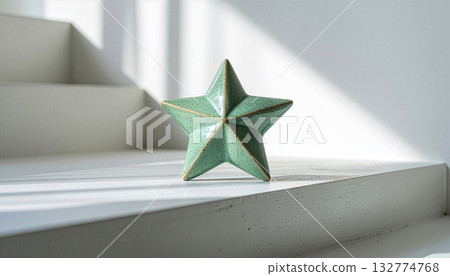 Minimalist sage green ceramic star on white stairs Minimalist sage green ceramic star on white stairs 132774768