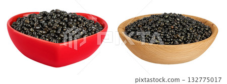 Black bean or Urad dal, black gram, vigna mungo in ceramic and wooden bowl isolated on the white background 132775017