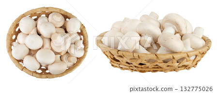 Fresh mushroom champignon in a wicker basket isolated on white background. Top view. Flat lay Fresh mushroom champignon in a wicker basket isolated on white background. Top view. Flat lay 132775026