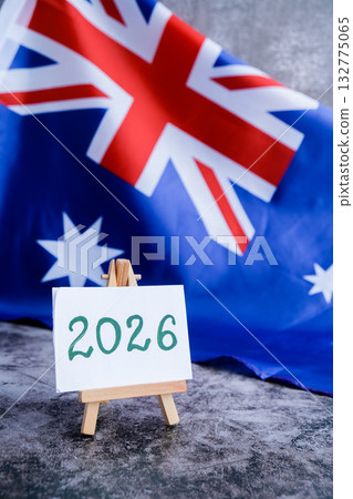 Australian flag and text 2026 trendy template for upcoming year campaigns. Patriotic design marking 2026 beside national flag. Concept of future vision and planning ideal for annual report or goal Australian flag and text 2026 trendy template for upcoming year campaigns. Patriotic design marking 2026 beside national flag. Concept of future vision and planning ideal for annual report or goal 132775065
