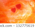 Image of two hearts drawn together in a red storm 132775619