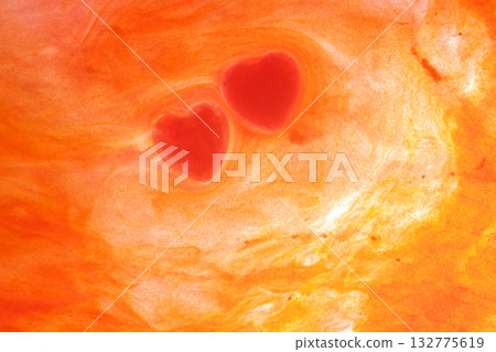 Image of two hearts drawn together in a red storm 132775619