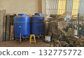 Two Blue Water Tanks in Storage 132775772