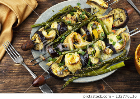 Freshly fish kebabs on skewers, barbecue. BBQ fish Freshly fish kebabs on skewers, barbecue. BBQ fish 132776136