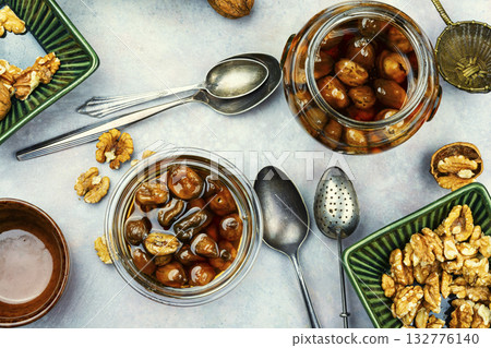 Aromatic jam from green walnuts. Aromatic jam from green walnuts. 132776140