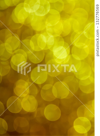 Christmas bokeh background with small yellow glitters 132776569