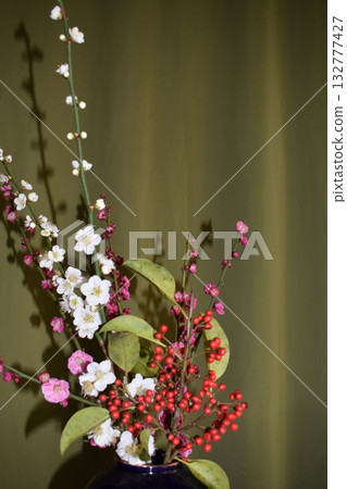 Red and white plum blossom arrangement 132777427