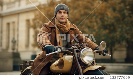 A vintage motorbike rider is happily enjoying an autumn setting on a scenic city street A vintage motorbike rider is happily enjoying an autumn setting on a scenic city street 132777699