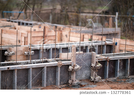 Construction of the foundation of a private house 132778361