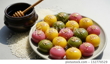 Korean Honey Glutinous Rice Cakes with Sesame Seeds Korean Honey Glutinous Rice Cakes with Sesame Seeds 132778529