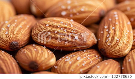Close Up of Salted Marcona Almonds with Sea Salt Crystals Close Up of Salted Marcona Almonds with Sea Salt Crystals 132778680