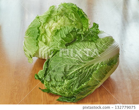 chinese cabbage on wooden background chinese cabbage on wooden background 132779075