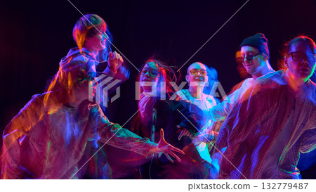 Street dance group illuminated by vibrant motion blur light Street dance group illuminated by vibrant motion blur light 132779487