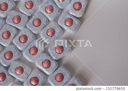 Minimalist design: cleaning tablets for dishwashing on a pure white background Minimalist design: cleaning tablets for dishwashing on a pure white background 132779650