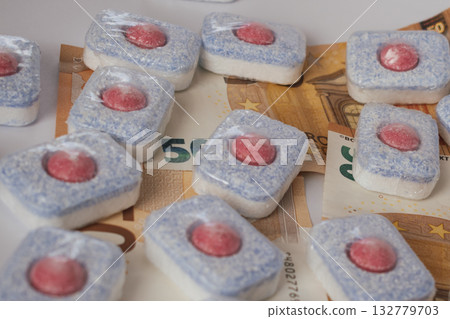 Cleaning supply expense: dishwasher tablets placed directly on euro banknotes Cleaning supply expense: dishwasher tablets placed directly on euro banknotes 132779703
