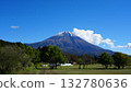 Mount Fuji, covered with its first snow, towering on a clear autumn day 132780636