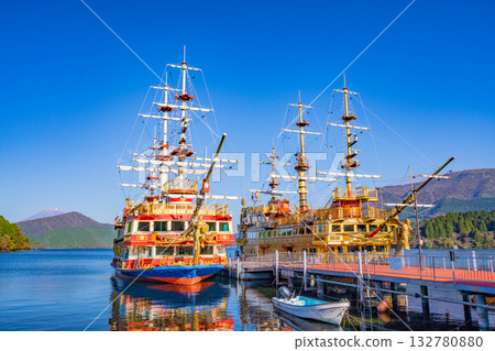 [Kanagawa Prefecture] A pleasure boat (pirate ship) anchored at Hakone-machi Port, with Mount Fuji in the background 132780880