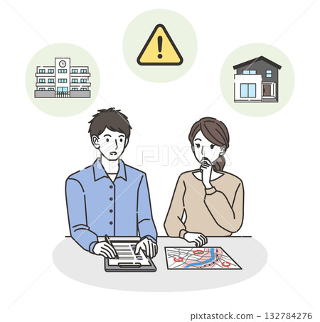 An image of a family checking evacuation routes and disaster prevention measures 132784276