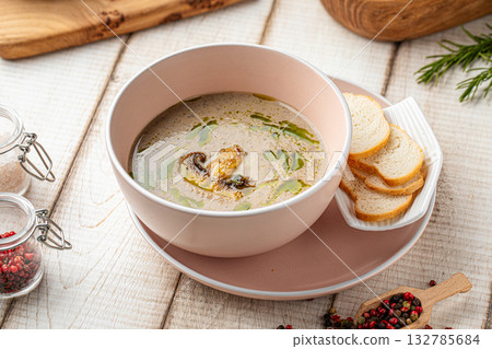 Creamy mushroom soup with croutons Creamy mushroom soup with croutons 132785684