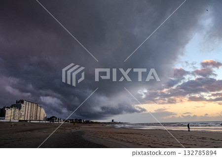Nieuwpoort, West-Vlaanderen, Belgium, September 13th, 2025, A Dramatic Sunset Overcast Beach 132785894