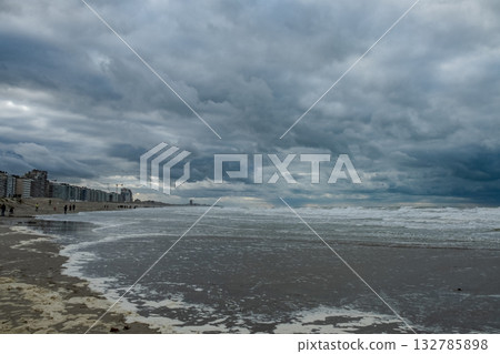 Nieuwpoort, West-Vlaanderen, Belgium, Ocotber 25th, 2025, vast sands beneath dark clouds Nieuwpoort, West-Vlaanderen, Belgium, Ocotber 25th, 2025, vast sands beneath dark clouds 132785898