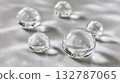 Transparent spherical water droplets - beauty and skin care refreshing concept 132787065