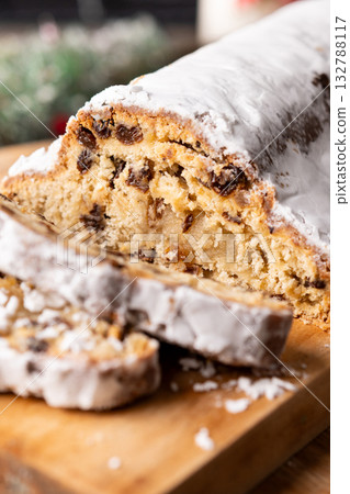Traditional Christmas Stollen with Raisins and Powdered Sugar Traditional Christmas Stollen with Raisins and Powdered Sugar 132788117