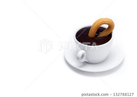 Spanish churros with hot thick chocolate in a white cup 132788127