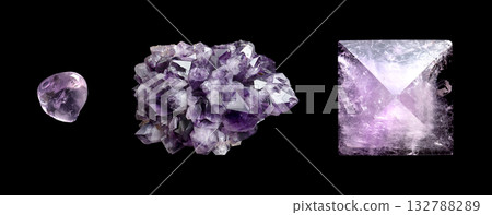 Amethyst, tumbled stone, cluster, and pyramid, close-up, from above, isolated, over black. Semi-precious stone, a variety of quartz, SiO2, of violet color, caused by iron impurities, and other metals. Amethyst, tumbled stone, cluster, and pyramid, close-up, from above, isolated, over black. Semi-precious stone, a variety of quartz, SiO2, of violet color, caused by iron impurities, and other metals. 132788289