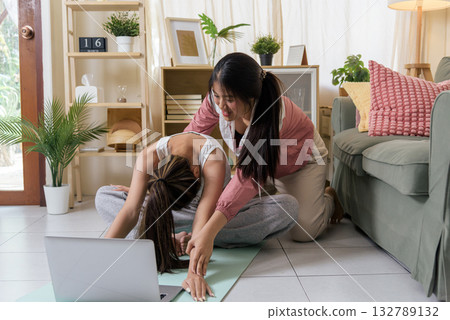 Women workout yoga active teen exercising sport friend learn fitness from online class, receiving guidance practicing healthy lifestyle together home, stretching body for wellness. Women workout yoga active teen exercising sport friend learn fitness from online class, receiving guidance practicing healthy lifestyle together home, stretching body for wellness. 132789132