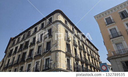 Architectural beauty of Madrid's historic buildings against a clear blue sky 132789535