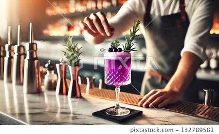 Close-up shots of a bartender's hand gently placing a purple cocktail onto a marble bar counter. The drink is served in an elegant martini glass with delicate garnishes, set against the backdrop of a Close-up shots of a bartender's hand gently placing a purple cocktail onto a marble bar counter. The drink is served in an elegant martini glass with delicate garnishes, set against the backdrop of a 132789581