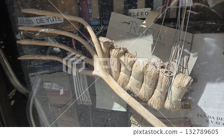 Natural fibers and rustic tools in vintage display for craft inspiration 132789605