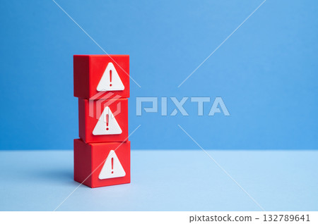 Blocks with warning signs. Danger signs. Errors and software bugs. Technological problems. Cybersecurity, industrial safety, and IT malfunction topics. 132789641