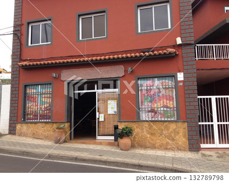 Local restaurant exterior in Tenerife town. Everyday island life, hospitality, and the warm culture of Spanish coastal living. 132789798