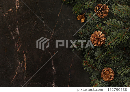 Festive winter greeting card and banner on the screen, Beautiful Christmas and New Year background with pine cones and live fir branches, product design for holiday advertising, Christmas Eve concept 132790588