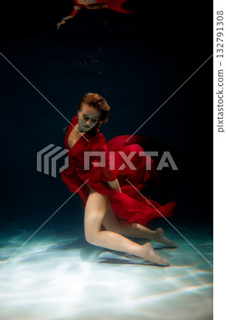 Deep feminine reflection, Serene female underwater portrait scene 132791308