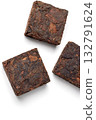 Black pu-erh Chinese tea. Pressed tiles of fermented black tea isolated on white background. 132791624