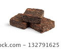 Three pieces of pressed fermented black tea isolated on white background. 132791625
