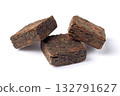 Three pieces of pressed fermented black tea isolated on white background. 132791627