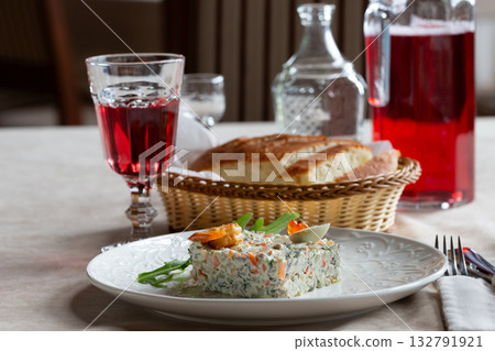 Olivier salad, vinaigrette salad and tartlets. Traditional russian appetizer for celebrating new year eve. Festive table setting. 132791921