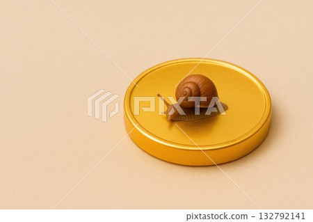 A snail on a golden stand is a symbol of slow wealth. Space for text. 132792141