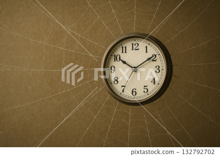 Wall clock covered with cobwebs. Space for text. Wall clock covered with cobwebs. Space for text. 132792702