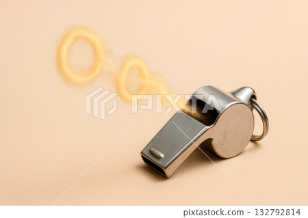 A metal whistle that emits golden smoke. 132792814