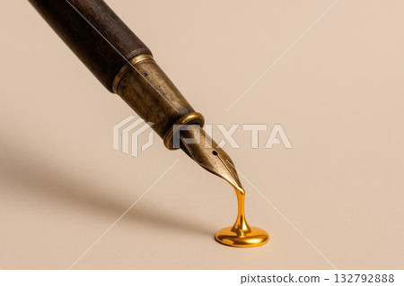 An antique fountain pen drips with gold ink. Space for text. An antique fountain pen drips with gold ink. Space for text. 132792888