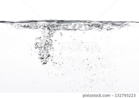 Water poured into tank, bubbles and splashes visible on white background 132793223